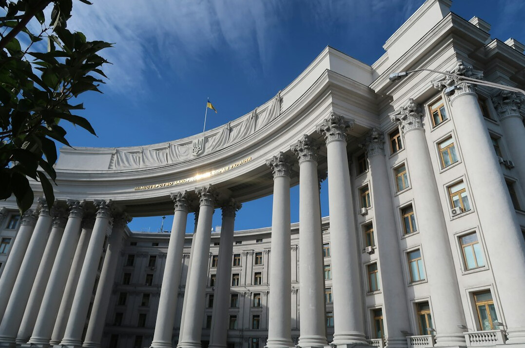 Grand government building facade with columns under daylight